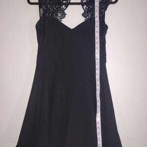 B. Smart Mini Dress With Black Lace Shoulder Detail.